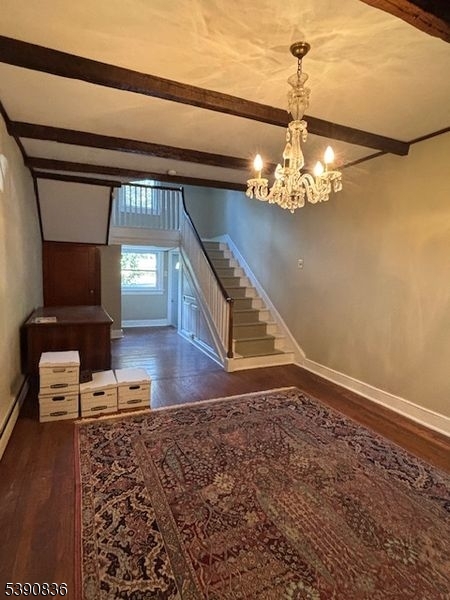 11 Mt Bethel Road Hackettstown, NJ 07840 - Photo 8 of 23 a view of a hallway with wooden floor and chandelier