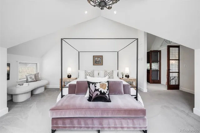 a living room with furniture and white wooden floor