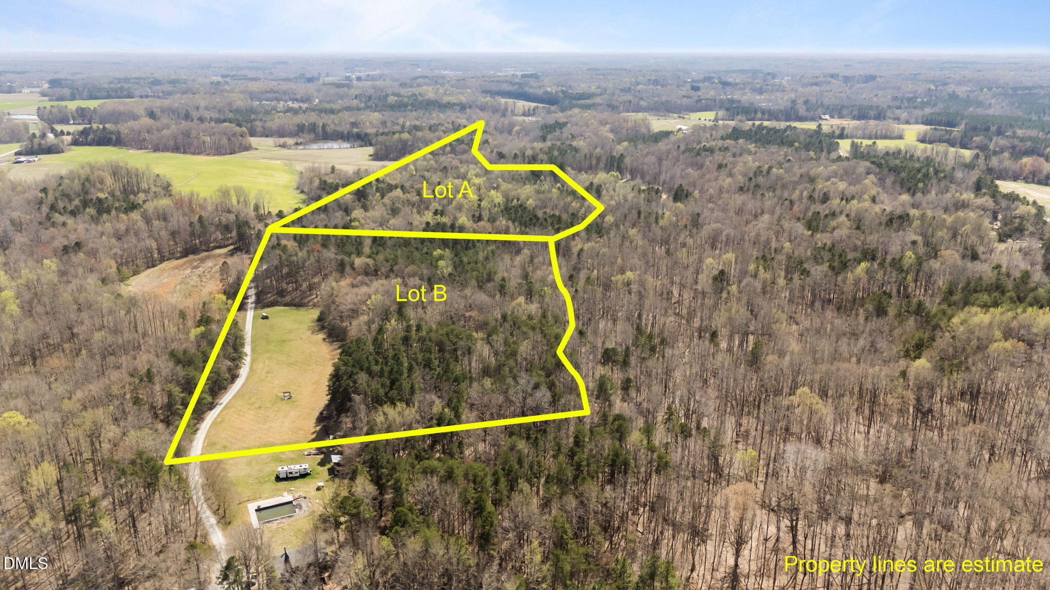8729 Allison Road Cedar Grove, NC 27231 - Photo 47 of 63 an aerial view of houses with a swimming pool