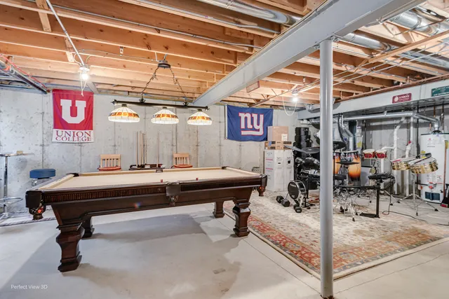 a room with table and chairs