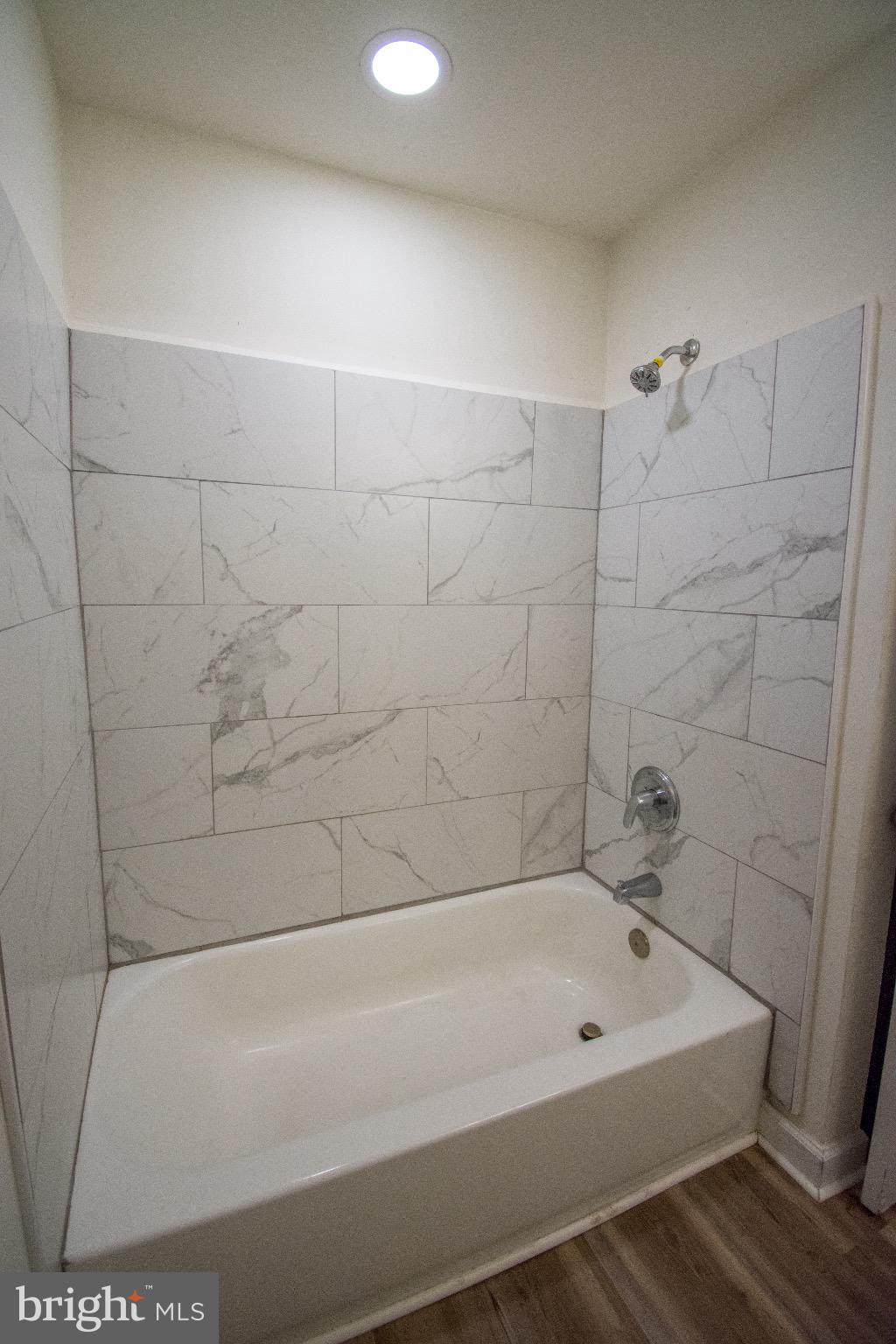 219 West Howard Street Hagerstown, MD 21740 - Photo 6 of 11 a bathroom with a bathtub