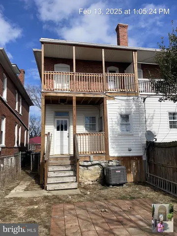 a front view of a house with a porch