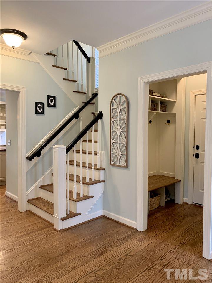 606 Scotts Ridge Trail Apex, NC 27502 - Photo 2 of 22 a view of entryway and hall with wooden floor
