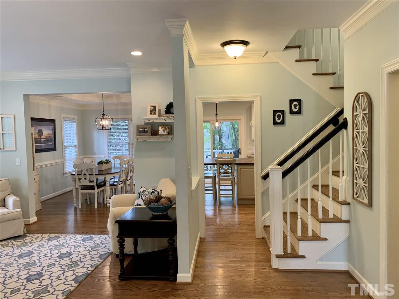 606 Scotts Ridge Trail Apex, NC 27502 - Photo 3 of 22 a living room with furniture and wooden floor