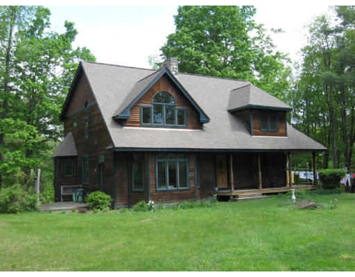 179 Franklin Hill Road Colrain, MA 01340 - Photo 1 of 1 a view of an house with backyard porch and garden