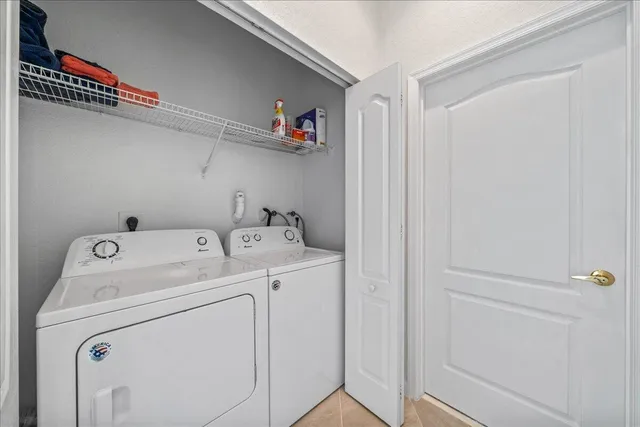 a view of a house with backyard sitting area and garden