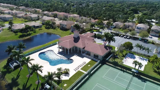 an aerial view of a house with a outdoor space