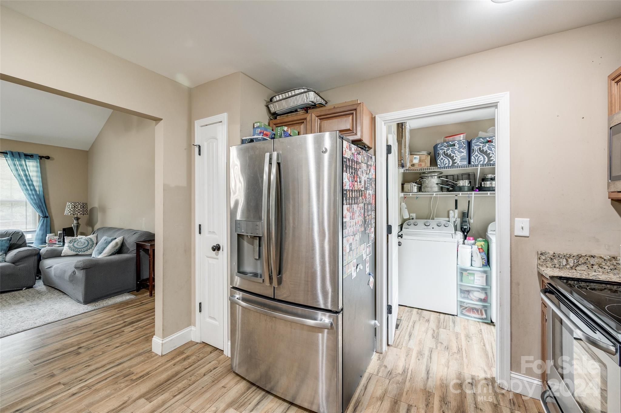 199 Cheek Road Clover, SC 29710 - Photo 12 of 27 a kitchen with stainless steel appliances a refrigerator and wooden floor