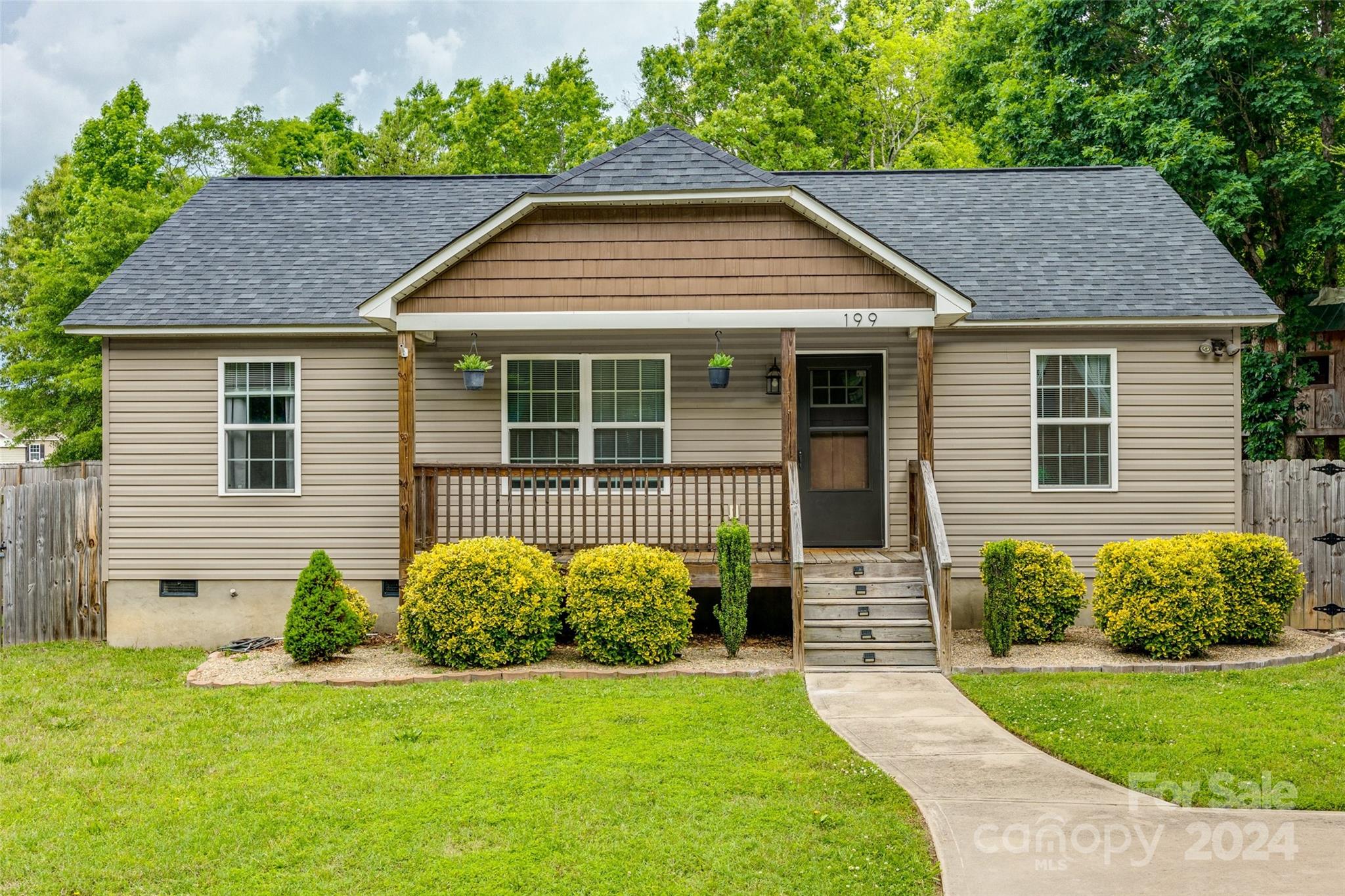 199 Cheek Road Clover, SC 29710 - Photo 2 of 27 a front view of a house with a yard