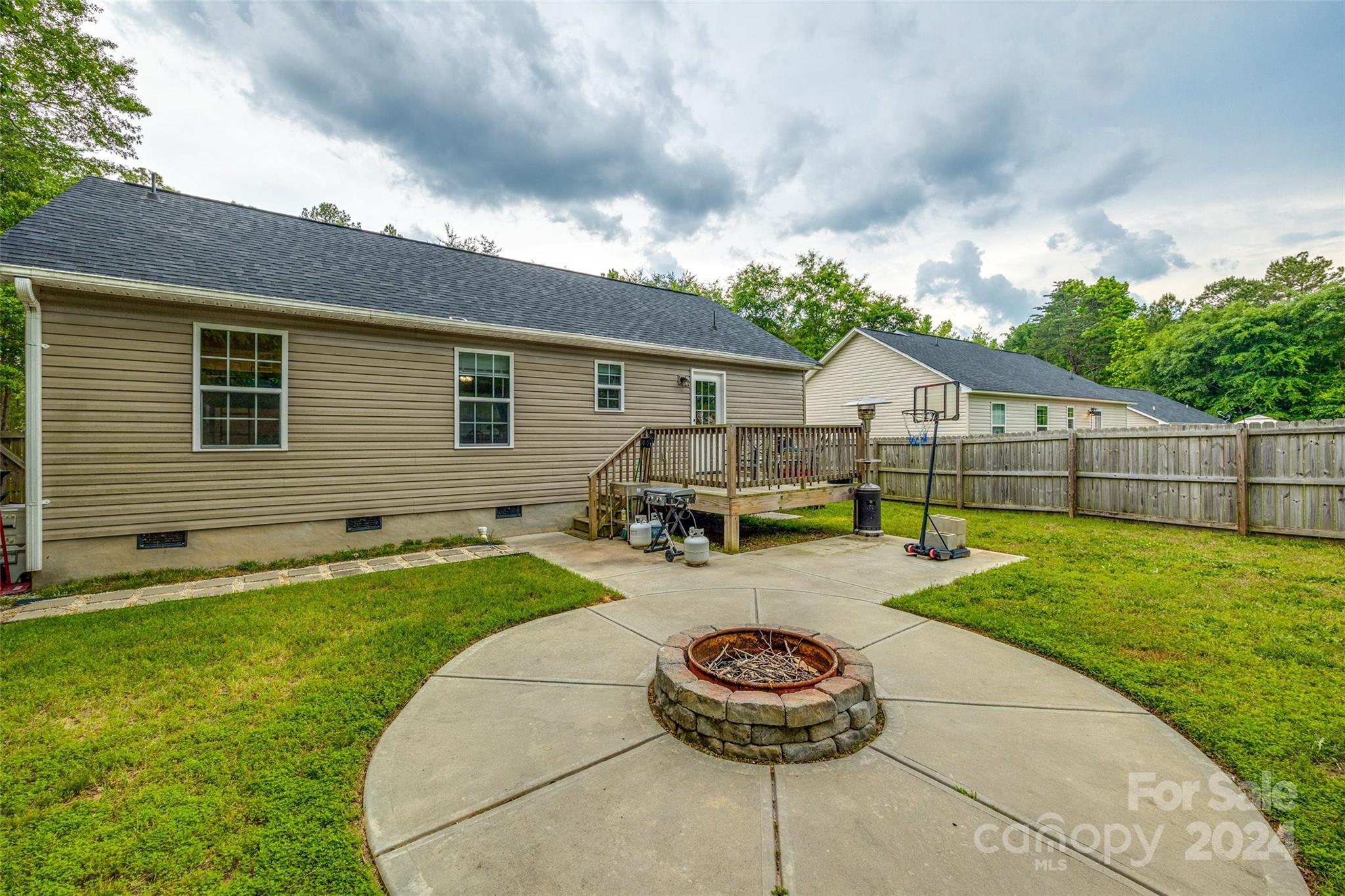 199 Cheek Road Clover, SC 29710 - Photo 24 of 27 a view of a house with backyard and sitting area