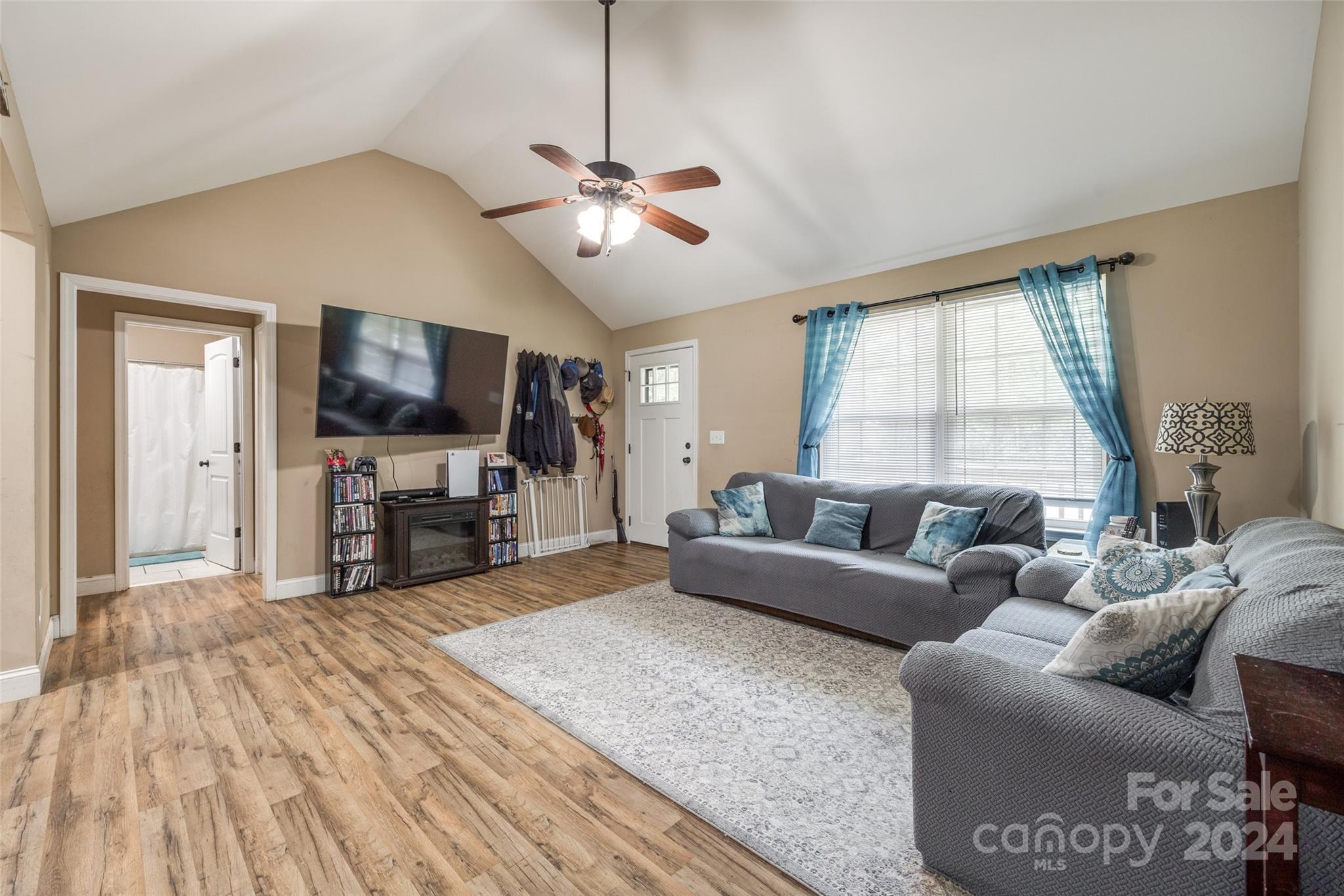199 Cheek Road Clover, SC 29710 - Photo 6 of 27 a living room with furniture and a flat screen tv