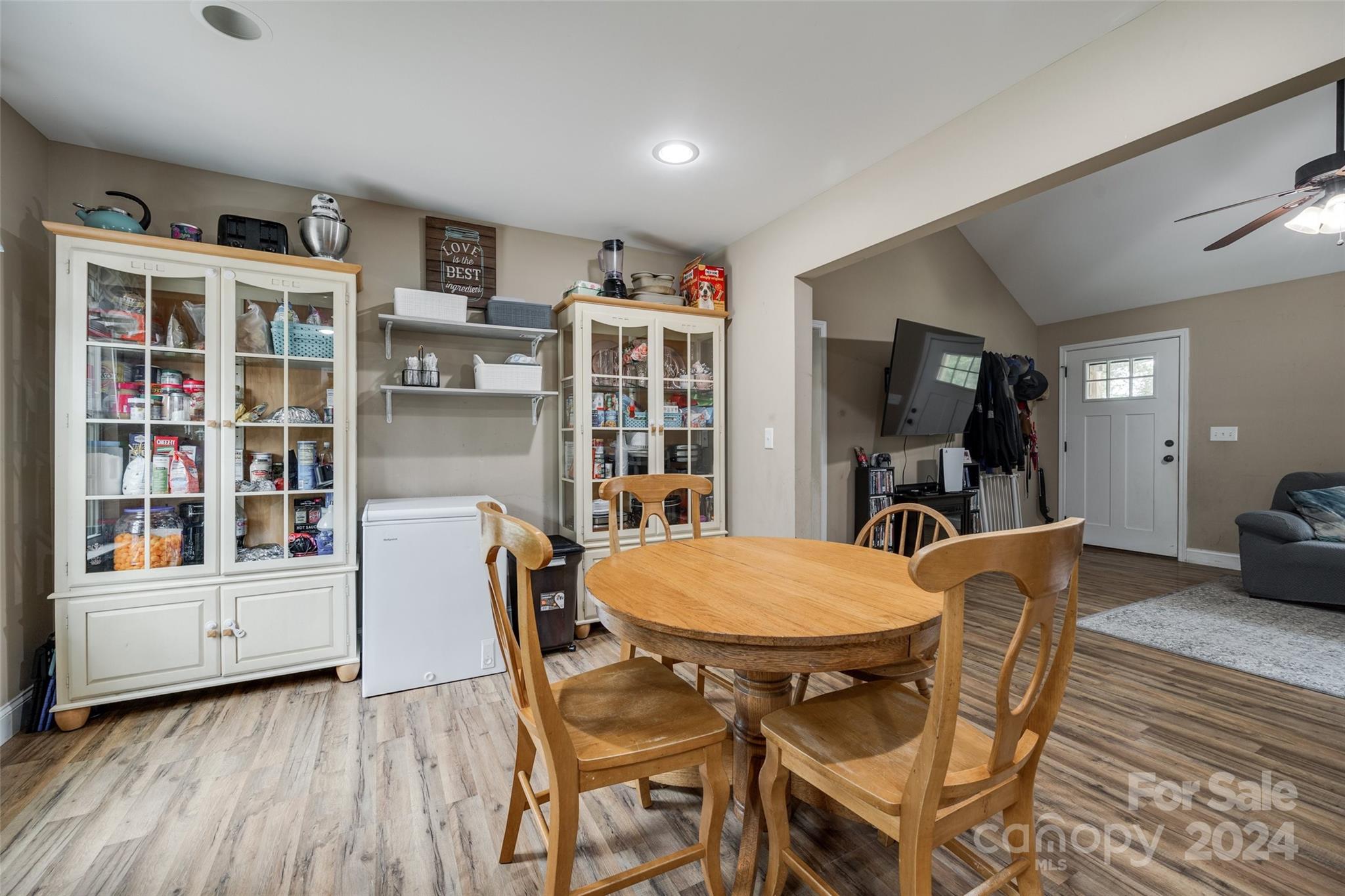 199 Cheek Road Clover, SC 29710 - Photo 8 of 27 a view of a dining room with furniture and wooden floor