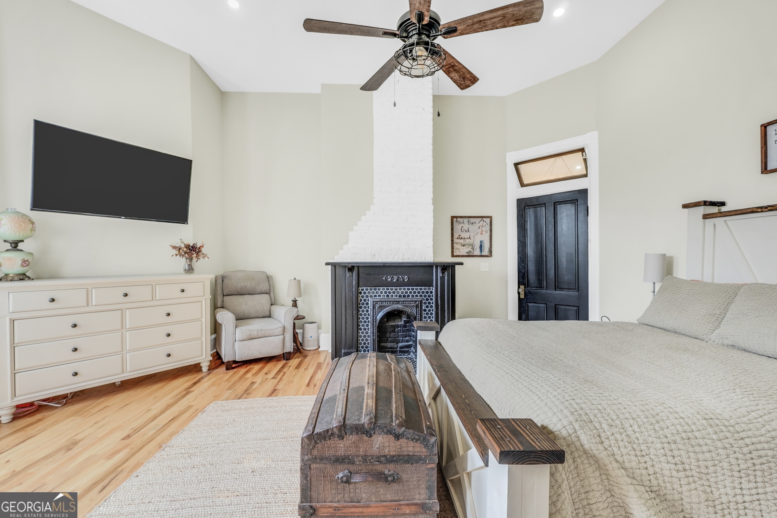 263 Julia Street Monticello, GA 31064 - Photo 25 of 48 a living room with furniture and a fireplace
