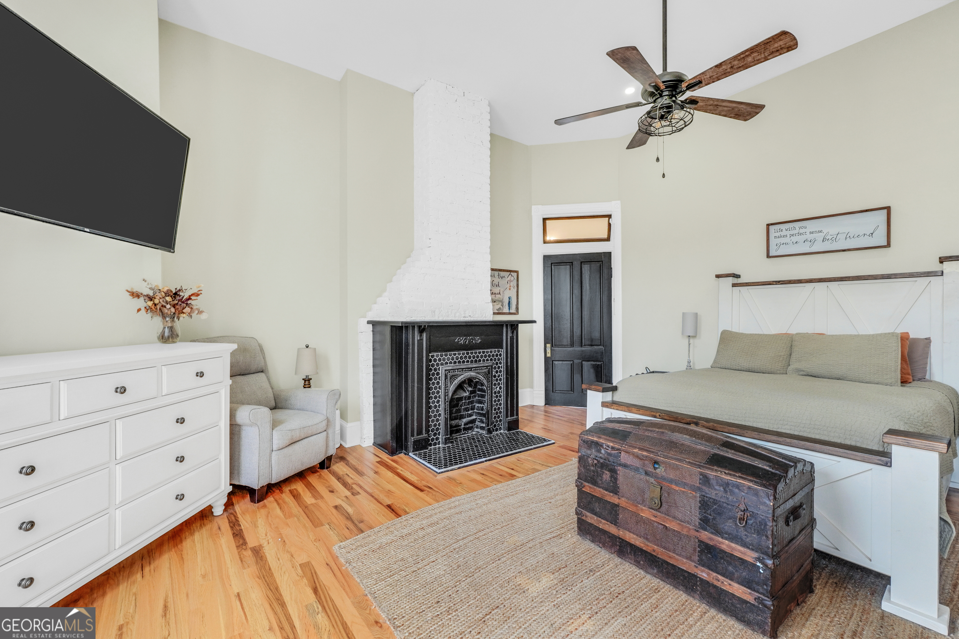 263 Julia Street Monticello, GA 31064 - Photo 26 of 48 a living room with furniture fireplace and flat screen tv