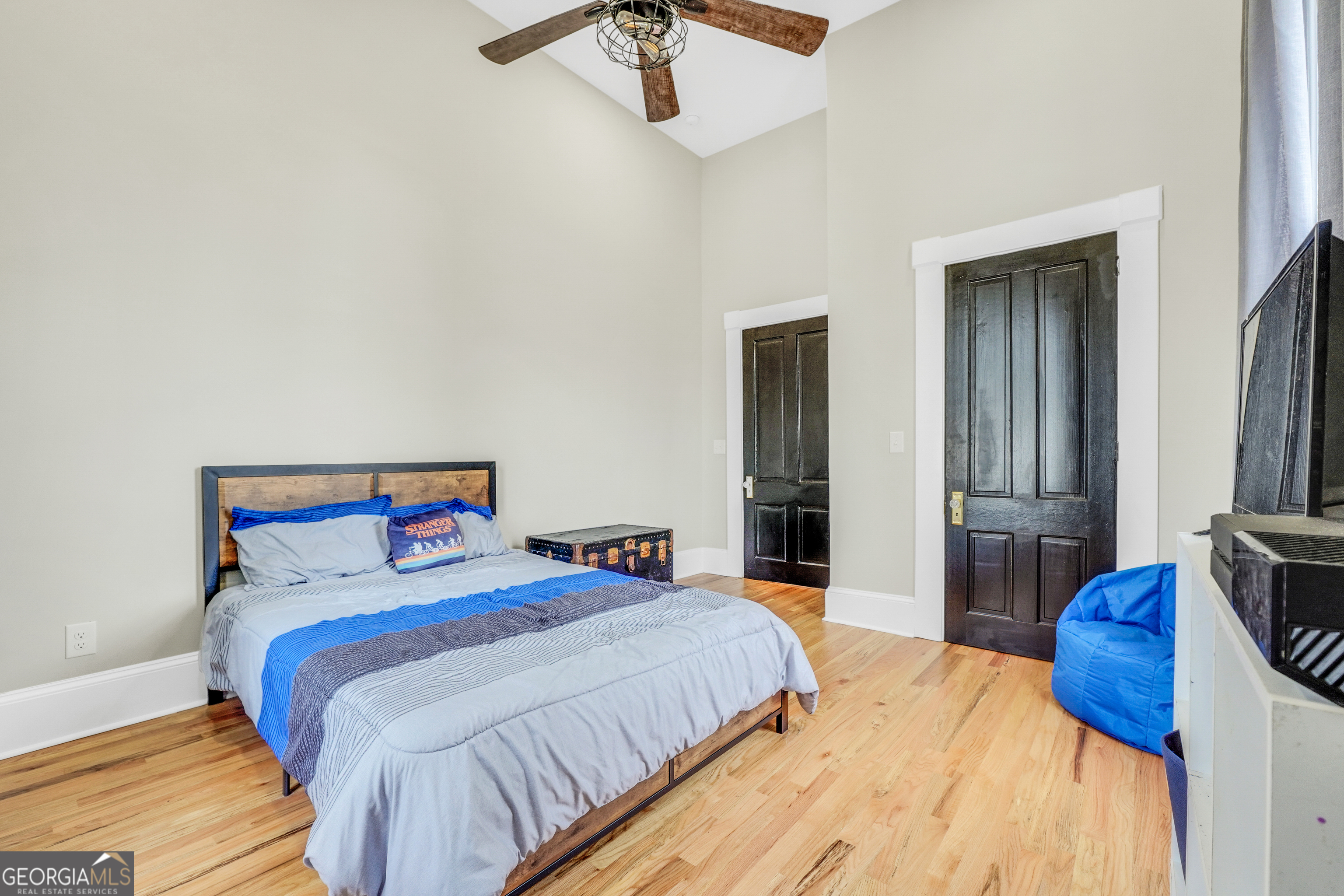 263 Julia Street Monticello, GA 31064 - Photo 44 of 48 a bedroom with bed and balcony