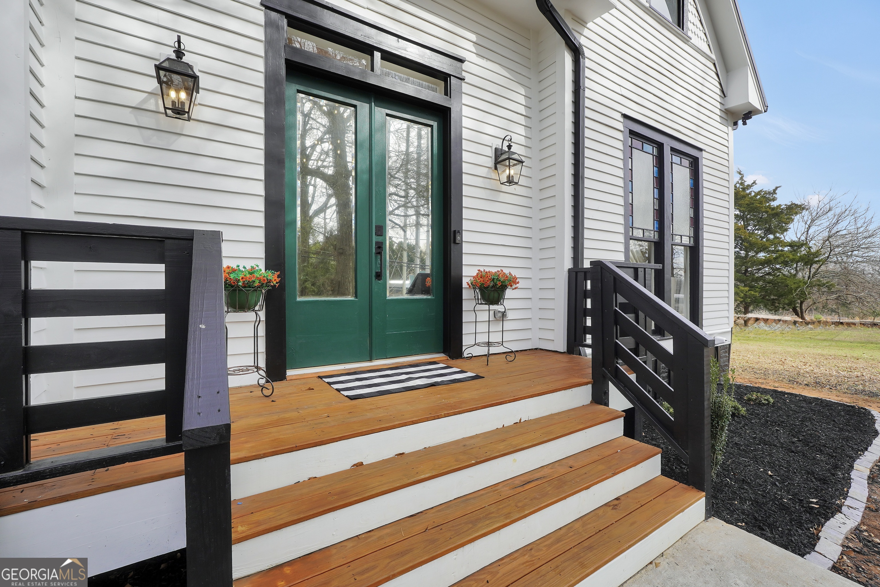 263 Julia Street Monticello, GA 31064 - Photo 5 of 48 a front view of a house with a yard