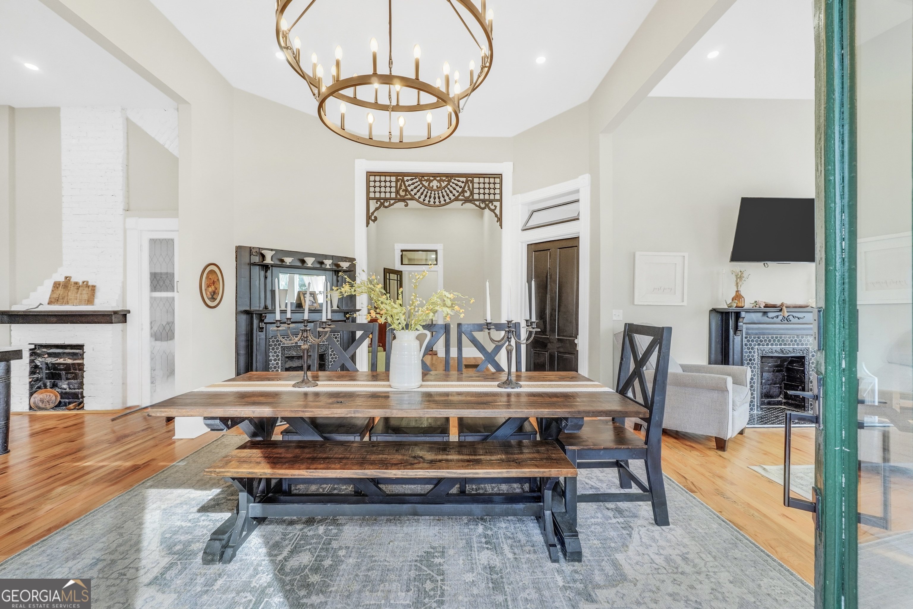 263 Julia Street Monticello, GA 31064 - Photo 6 of 48 a living room with furniture and chandelier