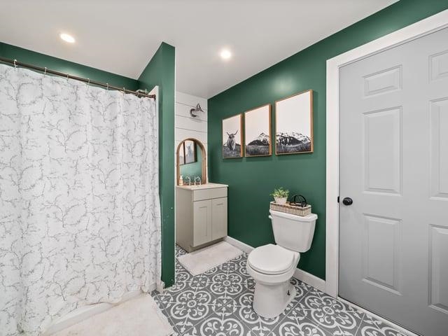 8294 North Leaf River Road Leaf River, IL 61047 - Photo 17 of 56 a bathroom with a toilet and a shower