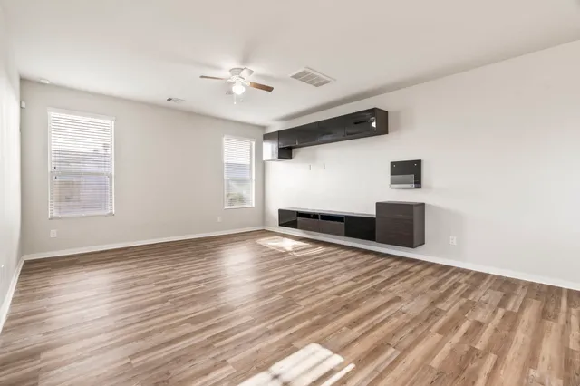 a bathroom with a sink and a large mirror