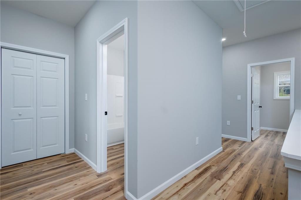 200 Back Pine Way, Unit B Ellijay, GA 30536 - Photo 16 of 29 a view of hallway with wooden floor