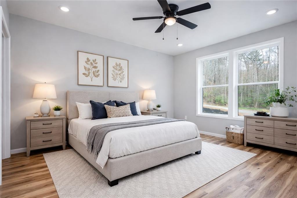 200 Back Pine Way, Unit B Ellijay, GA 30536 - Photo 17 of 29 a bedroom with a large bed and a window