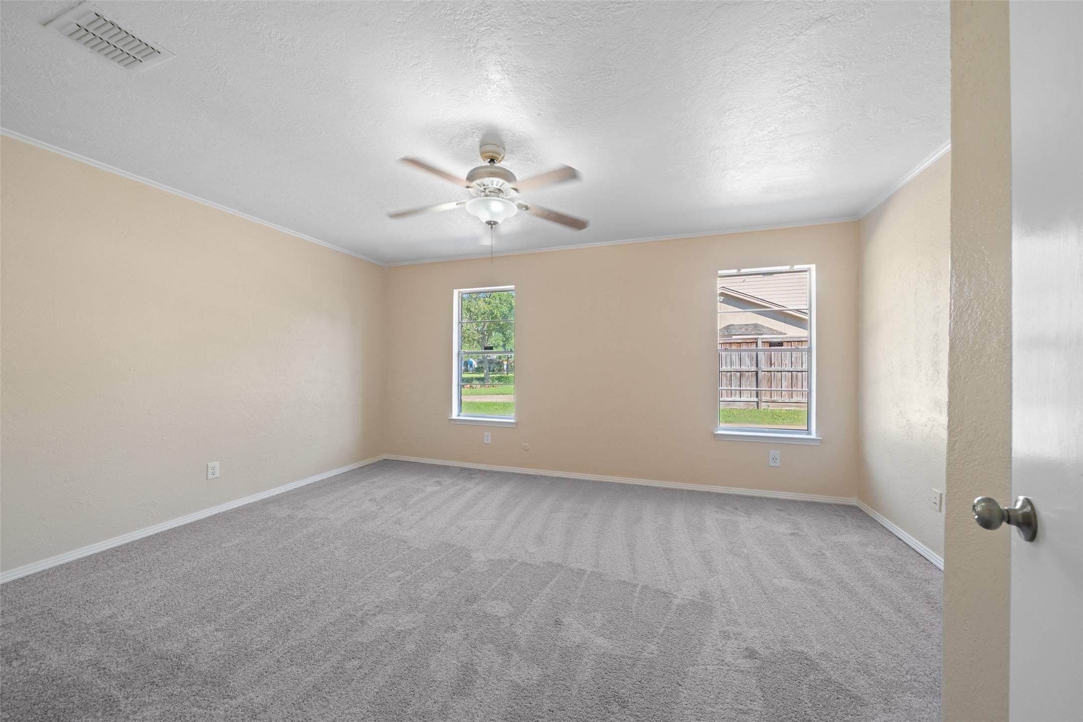 19218 Enchanted Oaks Drive Spring, TX 77388 - Photo 12 of 20 a view of an empty room with a window