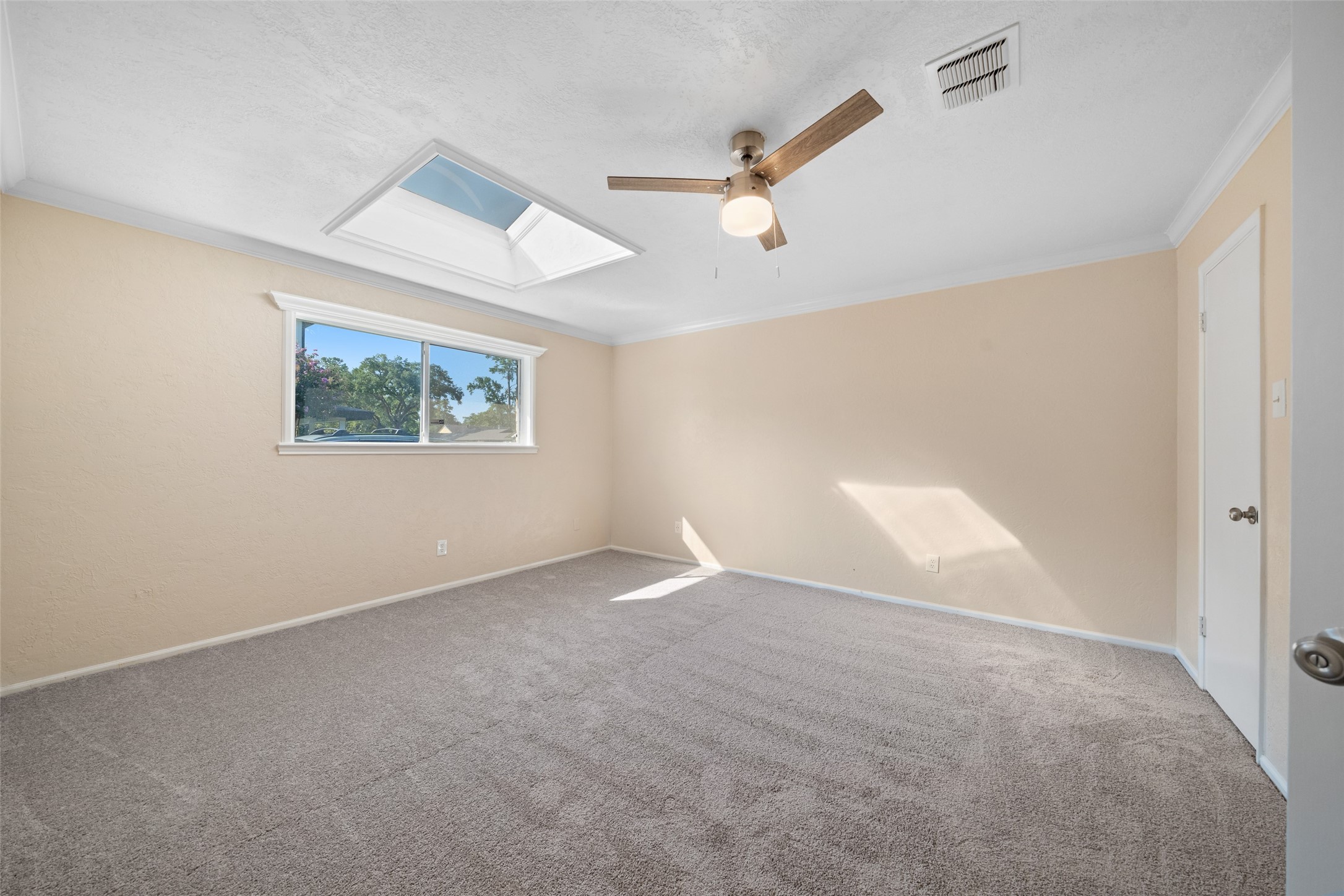 19218 Enchanted Oaks Drive Spring, TX 77388 - Photo 14 of 20 a view of an empty room with a window