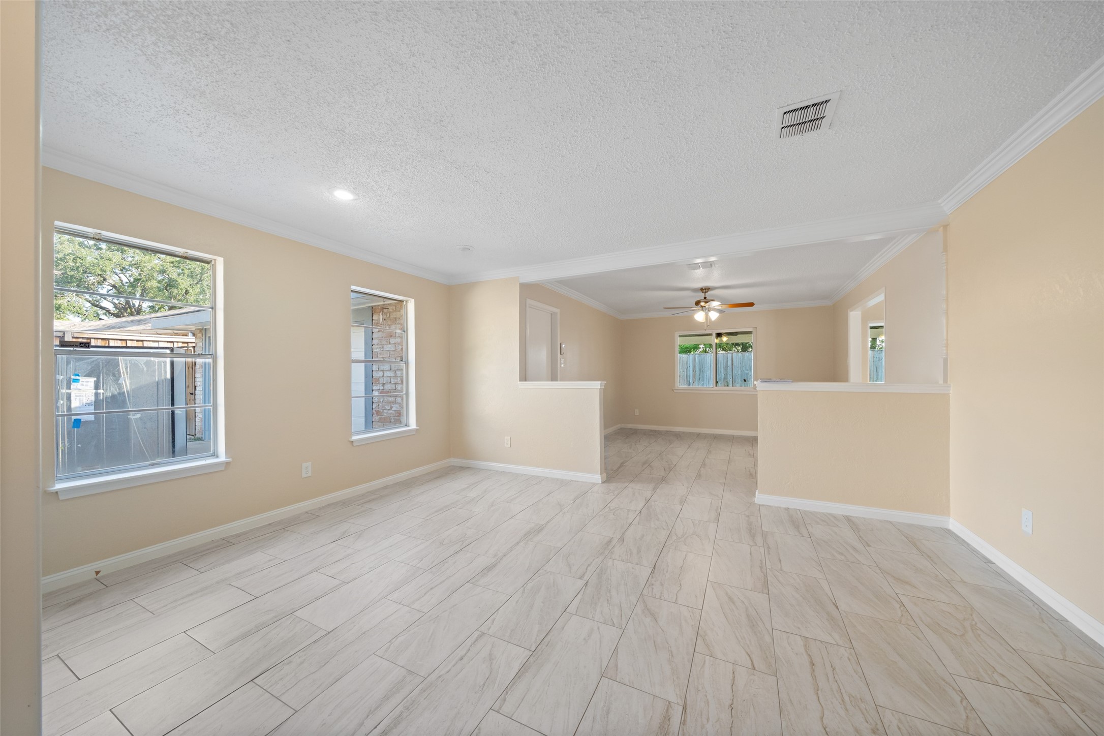 19218 Enchanted Oaks Drive Spring, TX 77388 - Photo 16 of 20 wooden floor in an empty room with a window