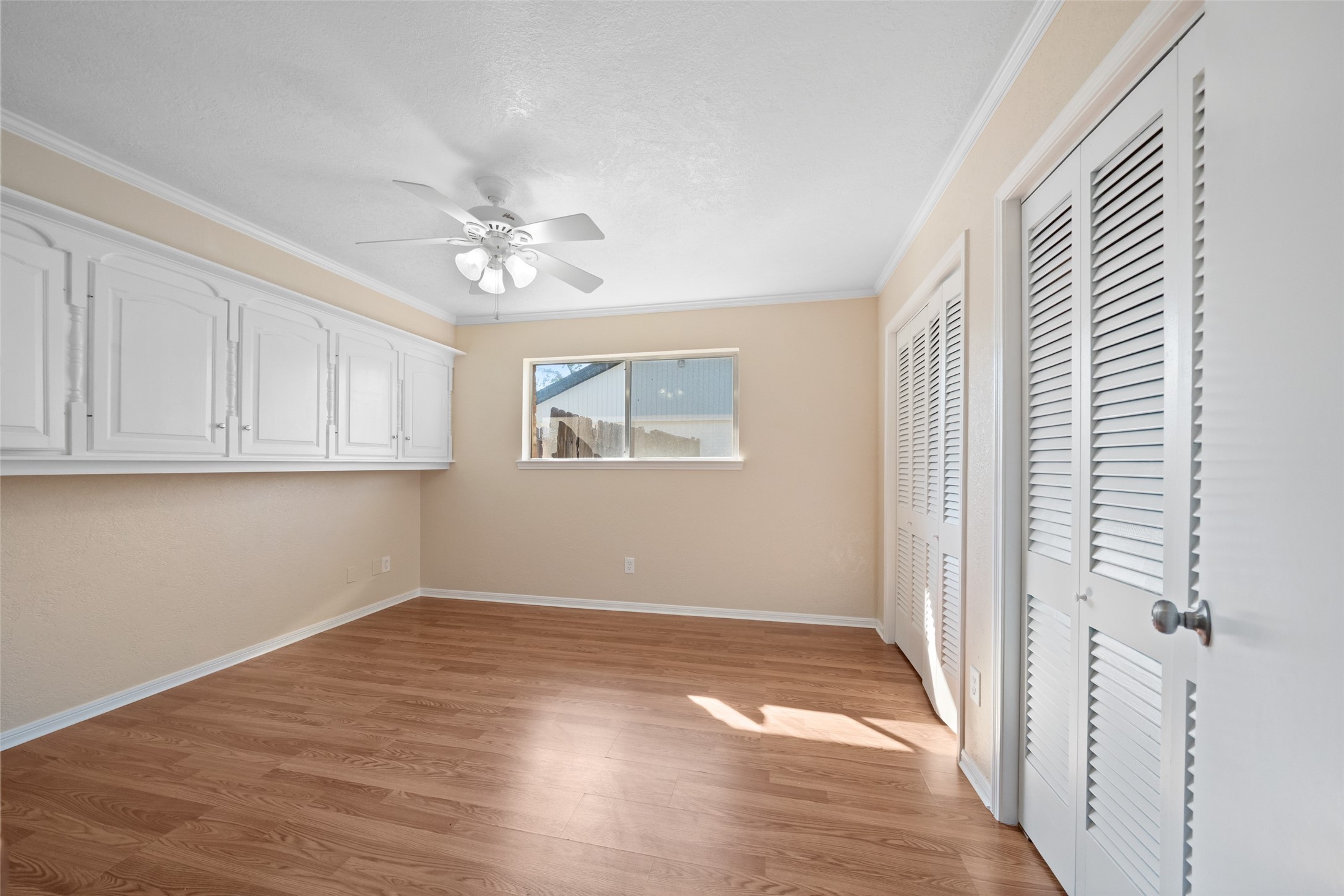 19218 Enchanted Oaks Drive Spring, TX 77388 - Photo 17 of 20 a view of a kitchen with wooden floor and a window