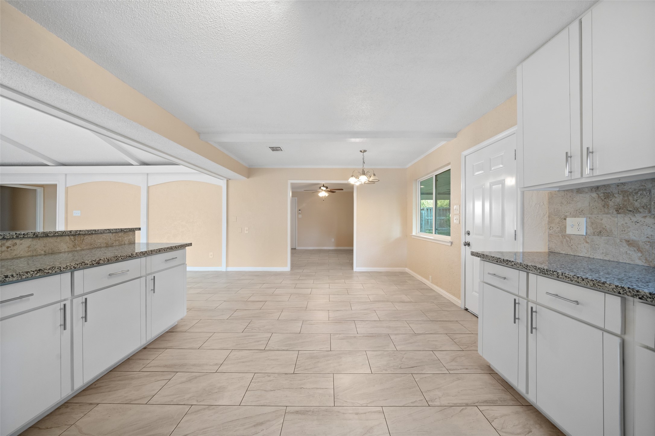 19218 Enchanted Oaks Drive Spring, TX 77388 - Photo 8 of 20 a large bathroom with a granite countertop sink and a bathtub