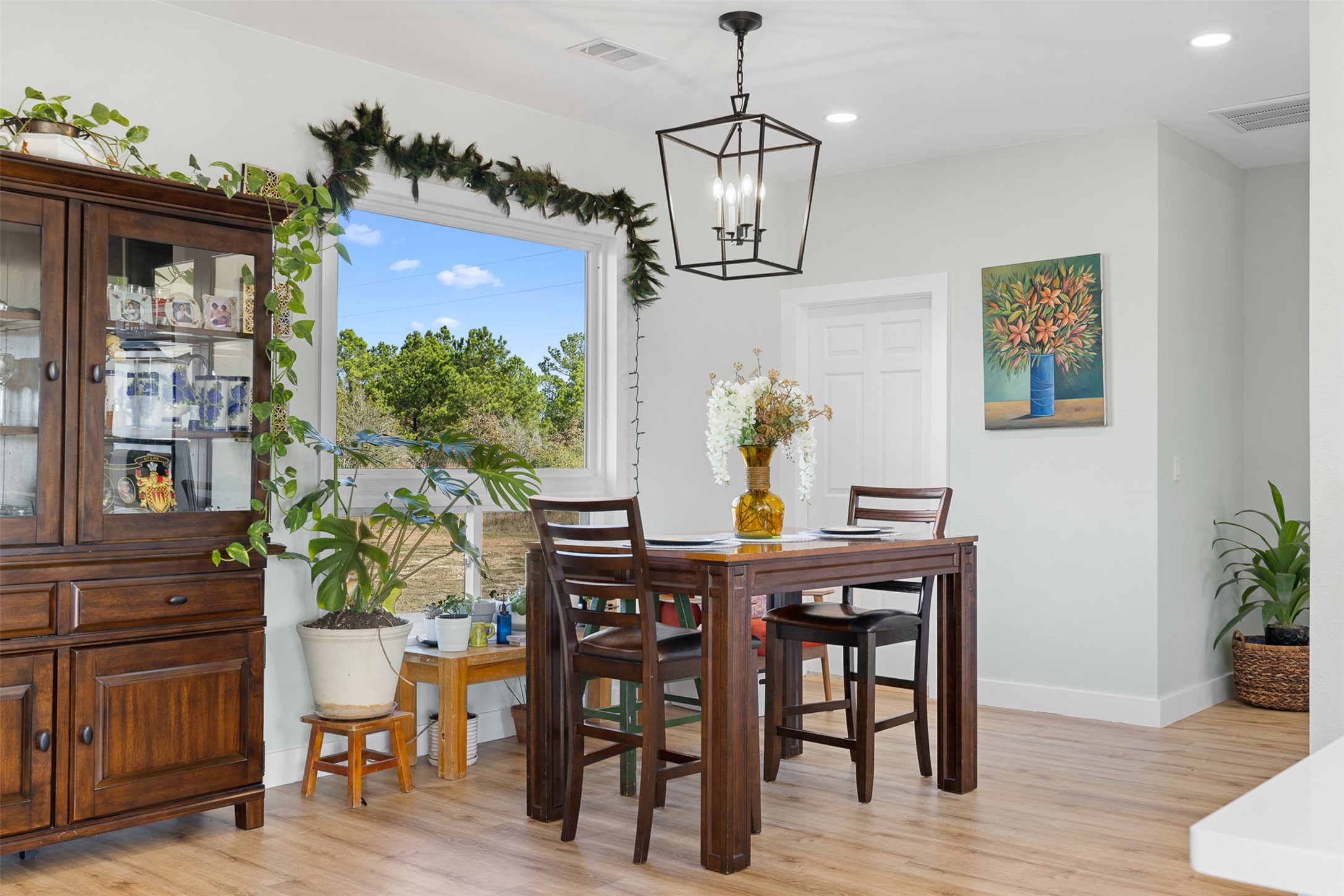 1759 Gotier Trace Road Paige, TX 78659 - Photo 2 of 40 a view of a dining room with furniture window and wooden floor