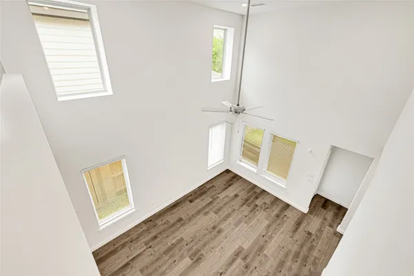a view of an entryway with wooden floor