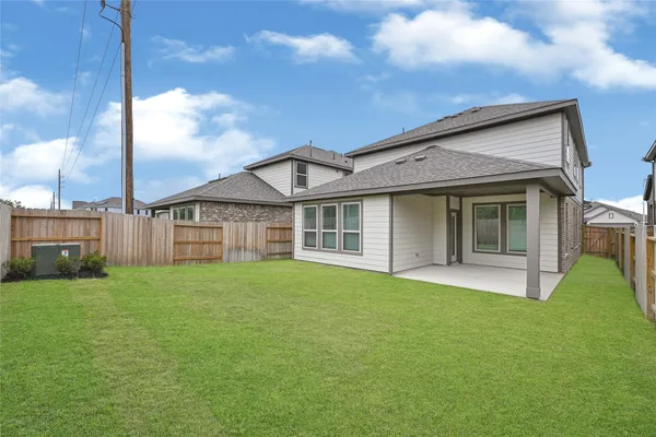 a house view with a garden space