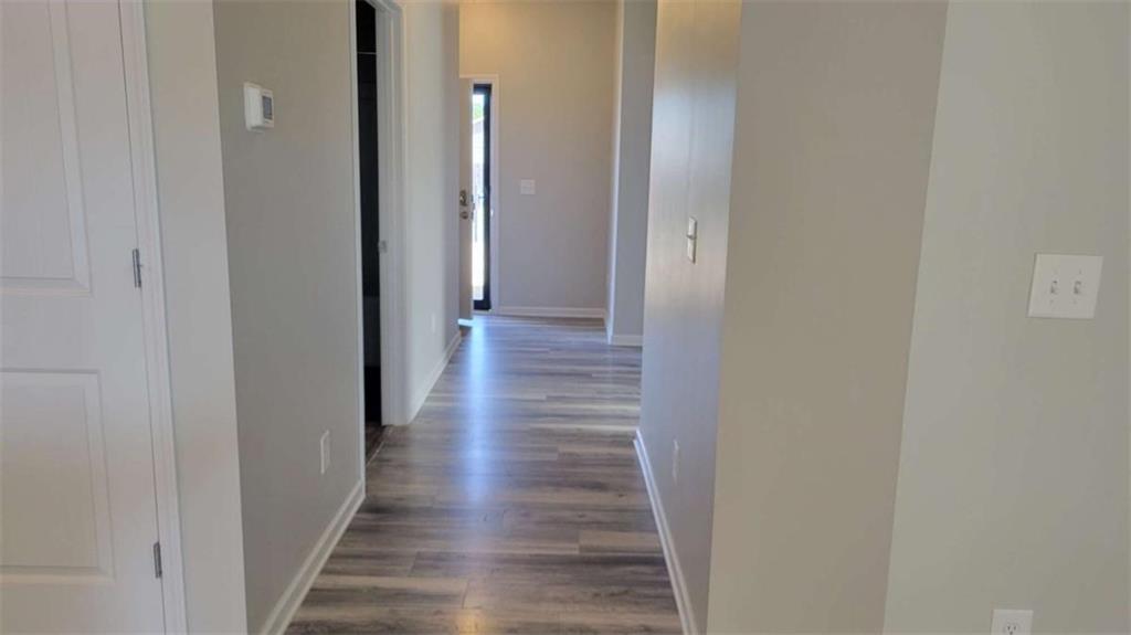 1 Berryrun Drive Rome, GA 30165 - Photo 5 of 24 a view of a hallway with wooden floor