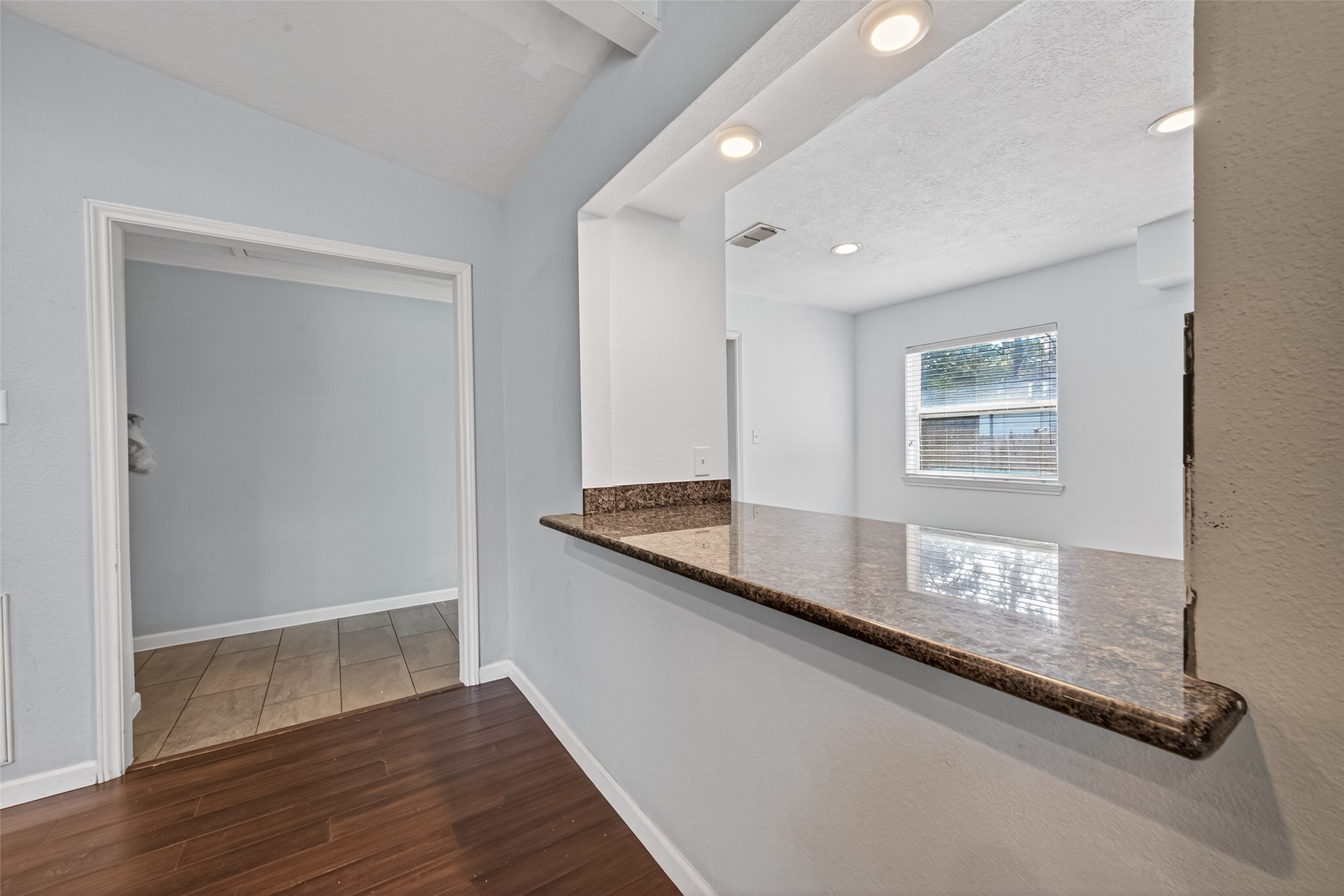 11811 Beverly Drive Houston, TX 77065 - Photo 22 of 48 From living space enter into hallway where bedrooms are located.