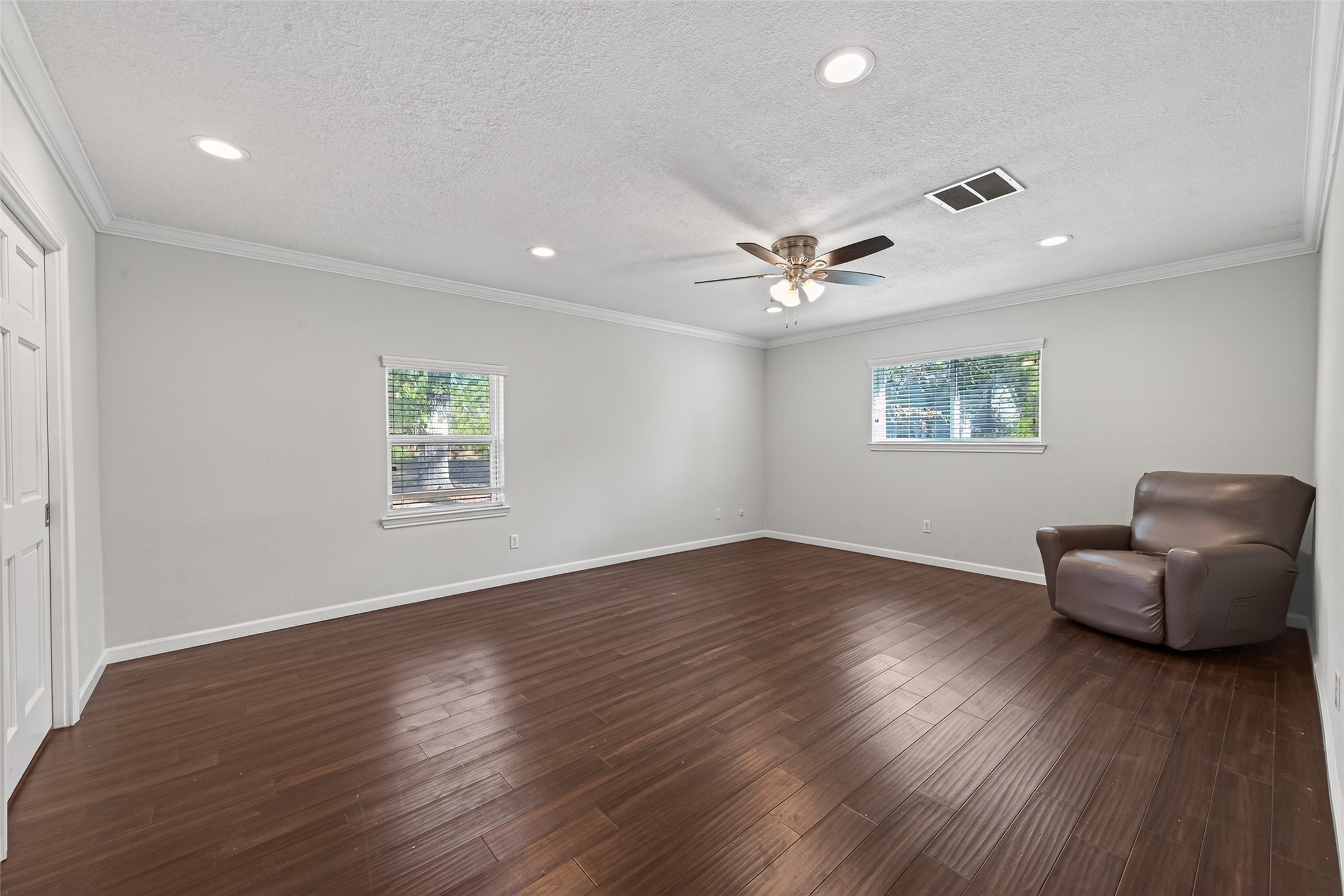 11811 Beverly Drive Houston, TX 77065 - Photo 35 of 48 a view of livingroom with furniture wooden floor and windows