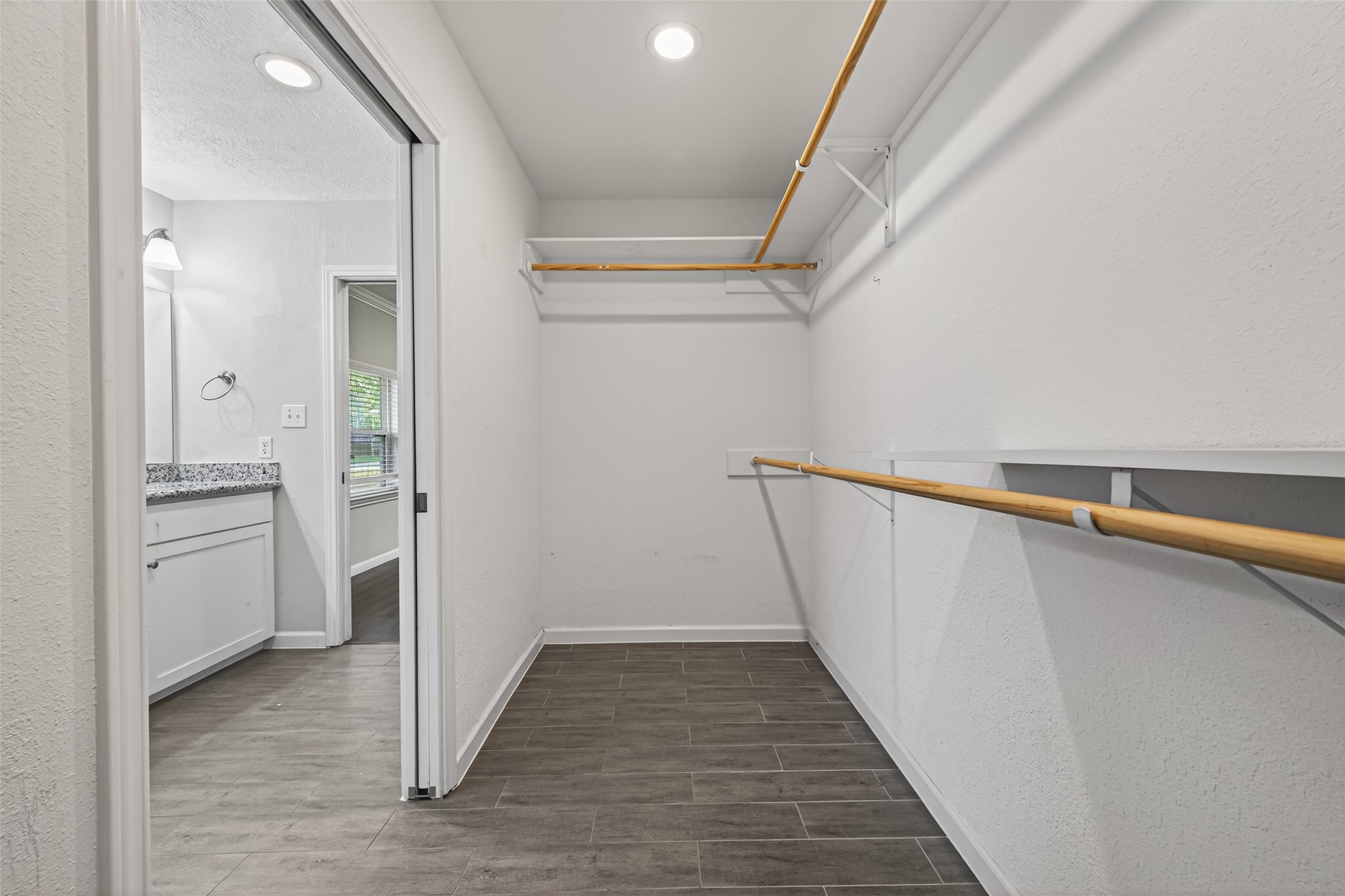 11811 Beverly Drive Houston, TX 77065 - Photo 38 of 48 a view of a hallway with wooden floor and staircase