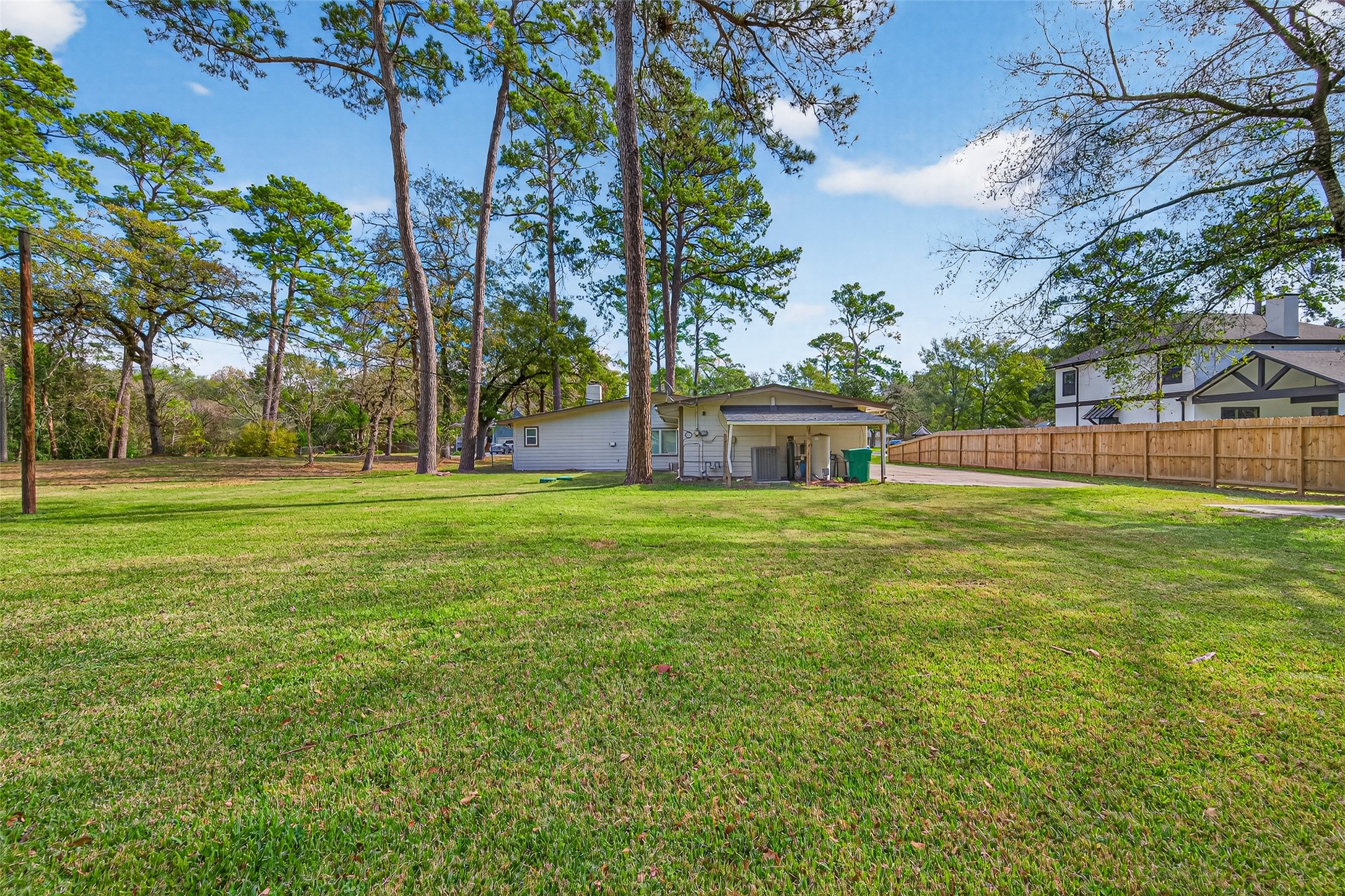 11811 Beverly Drive Houston, TX 77065 - Photo 45 of 48 a house view with swimming pool in front of it