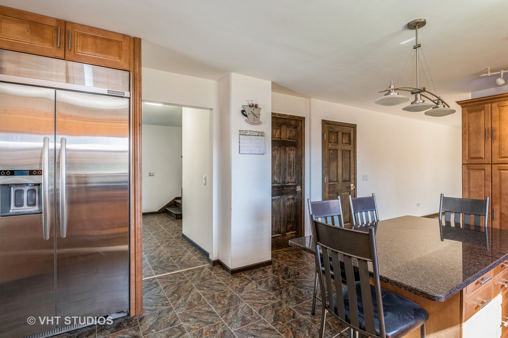 336 Oak Hill Court Antioch, IL 60002 - Photo 11 of 57 a view of a livingroom with furniture and refrigerator