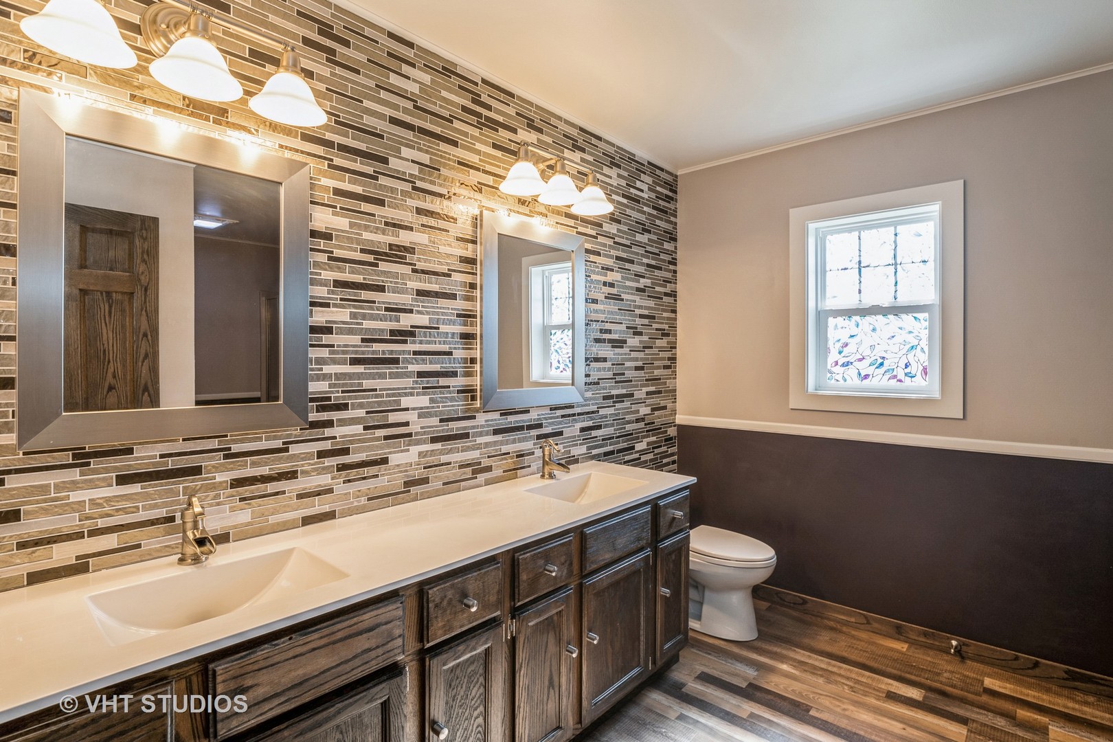 336 Oak Hill Court Antioch, IL 60002 - Photo 23 of 57 a bathroom with a double vanity sink toilet and a mirror