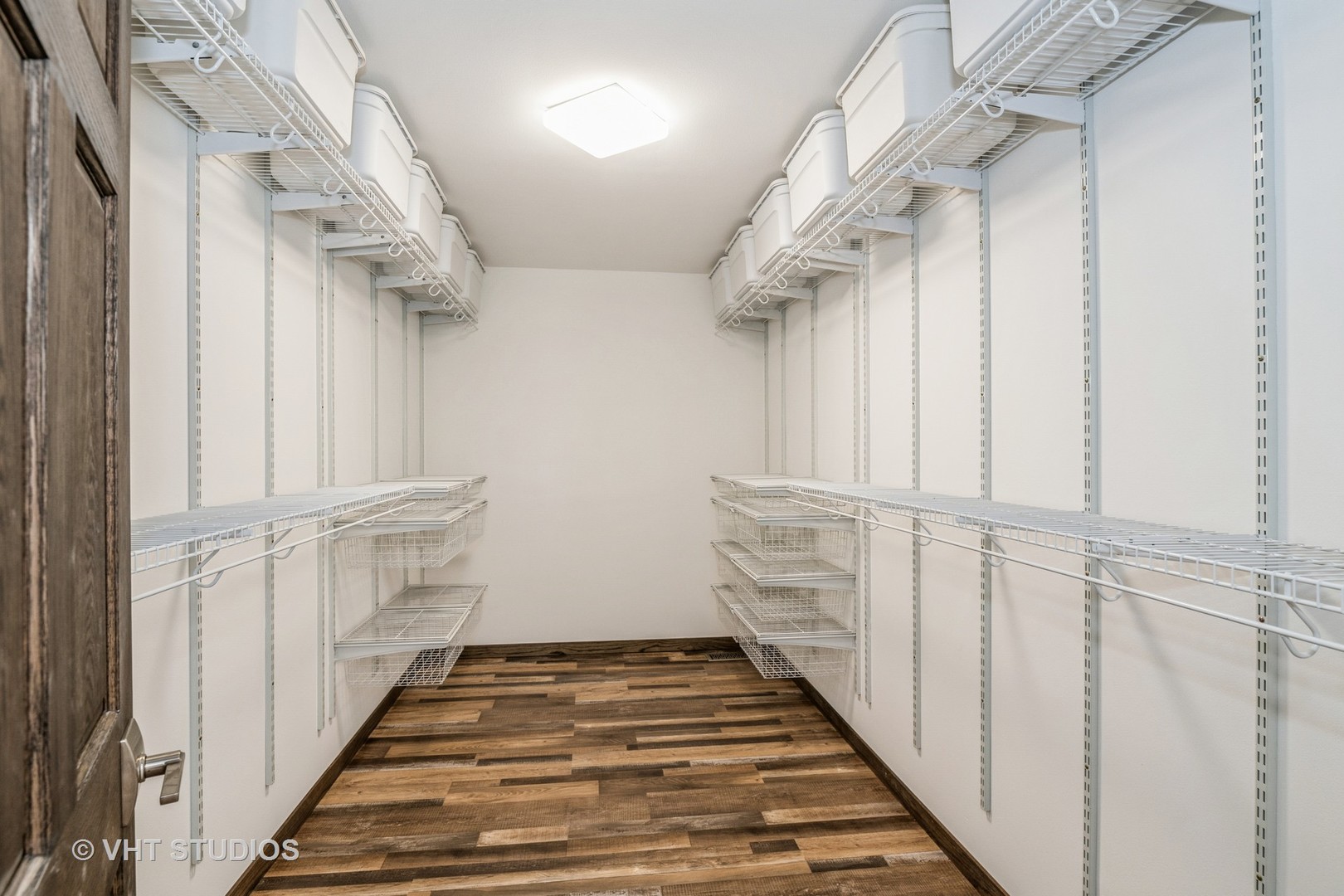 336 Oak Hill Court Antioch, IL 60002 - Photo 25 of 57 a view of a hallway with wooden floor and staircase
