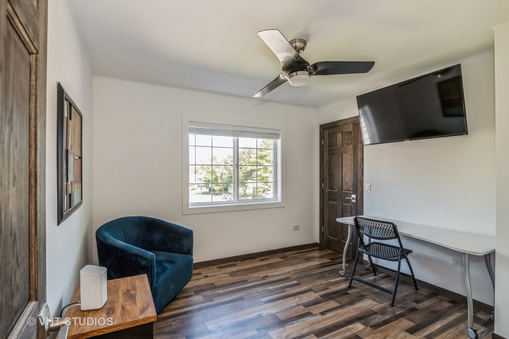 336 Oak Hill Court Antioch, IL 60002 - Photo 30 of 57 a living room with furniture and a flat screen tv