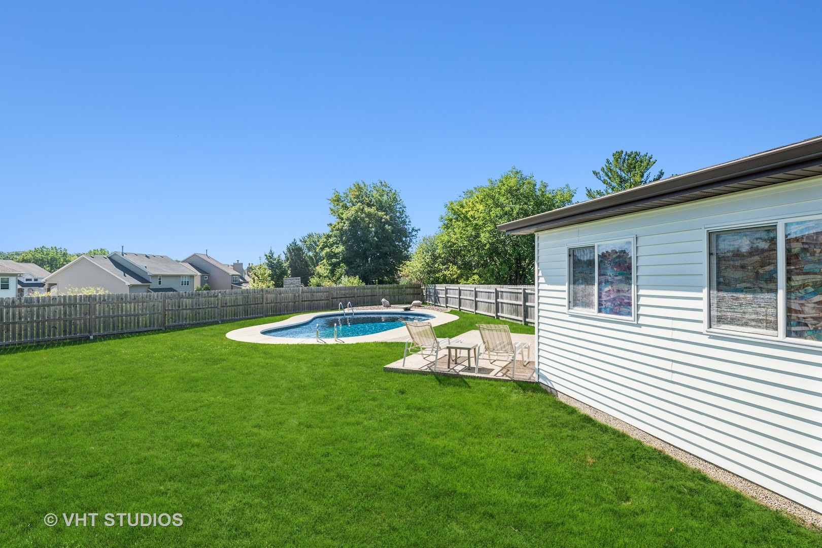 336 Oak Hill Court Antioch, IL 60002 - Photo 41 of 57 a view of a house with pool and a yard