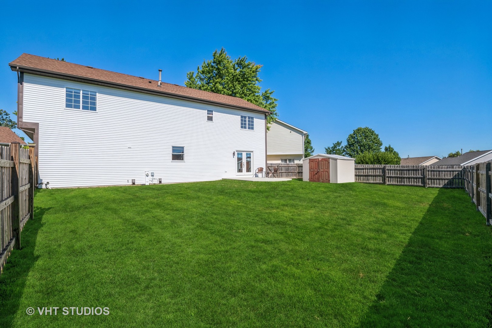 336 Oak Hill Court Antioch, IL 60002 - Photo 48 of 57 a front view of house with yard and green space