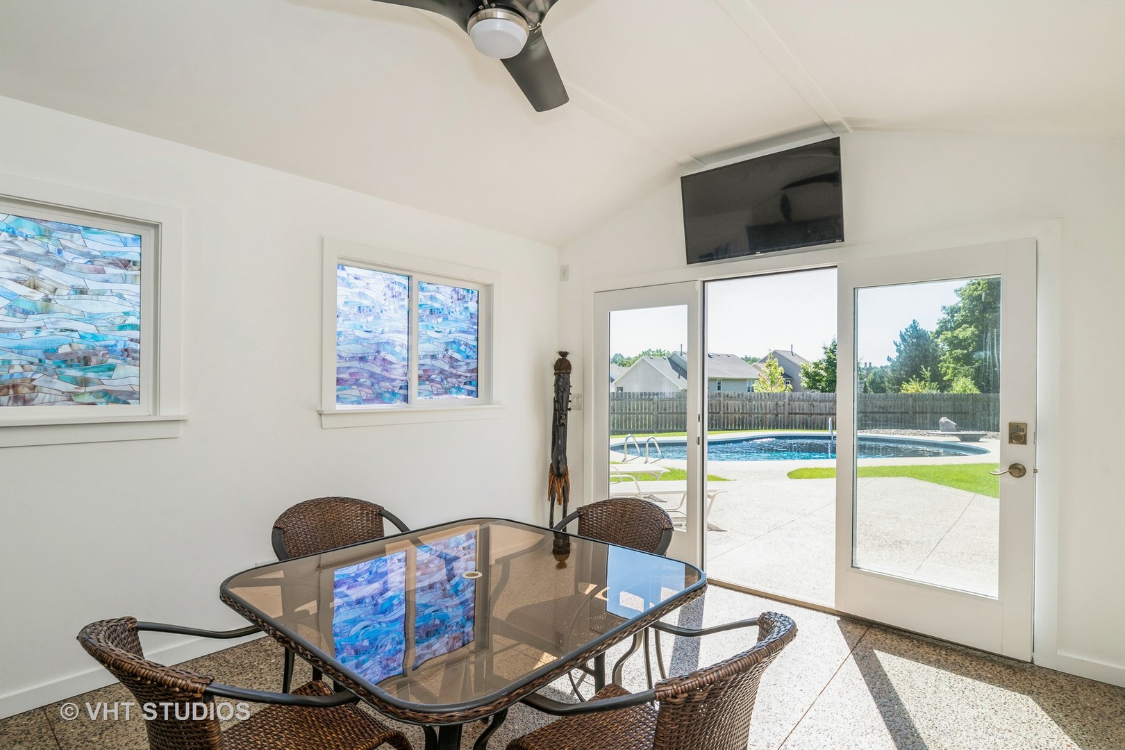 336 Oak Hill Court Antioch, IL 60002 - Photo 56 of 57 a dining room with furniture and a floor to ceiling window