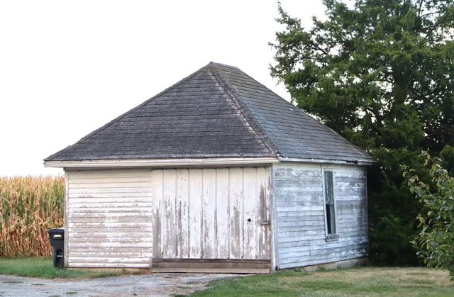 a backyard of a house with lots of green space