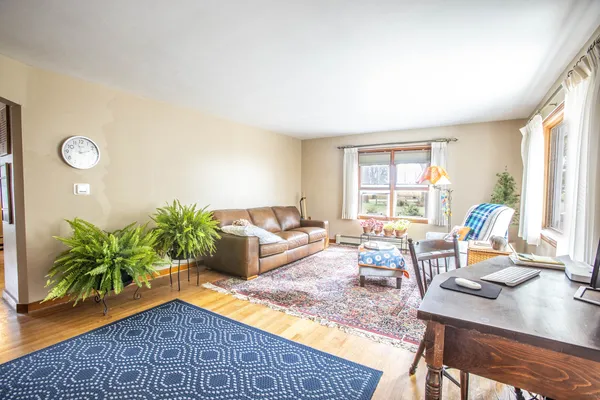 a living room with furniture and a window