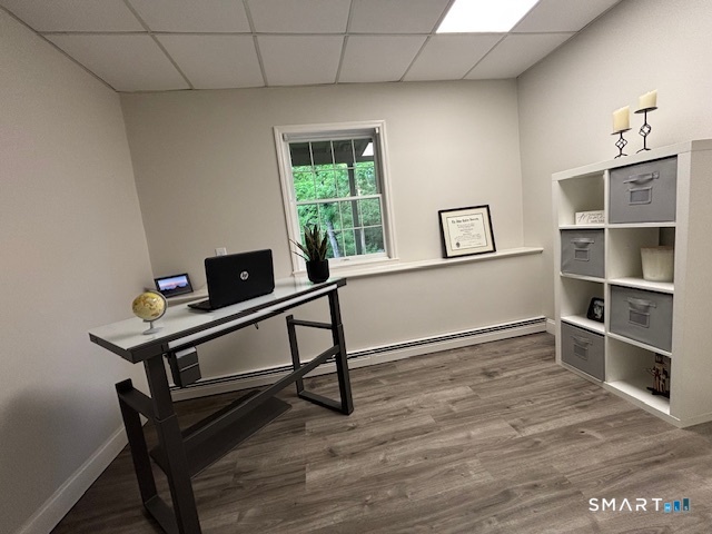 47 Merwin Brook Road Brookfield, CT 06804 - Photo 23 of 29 a view of a workspace with furniture and a window