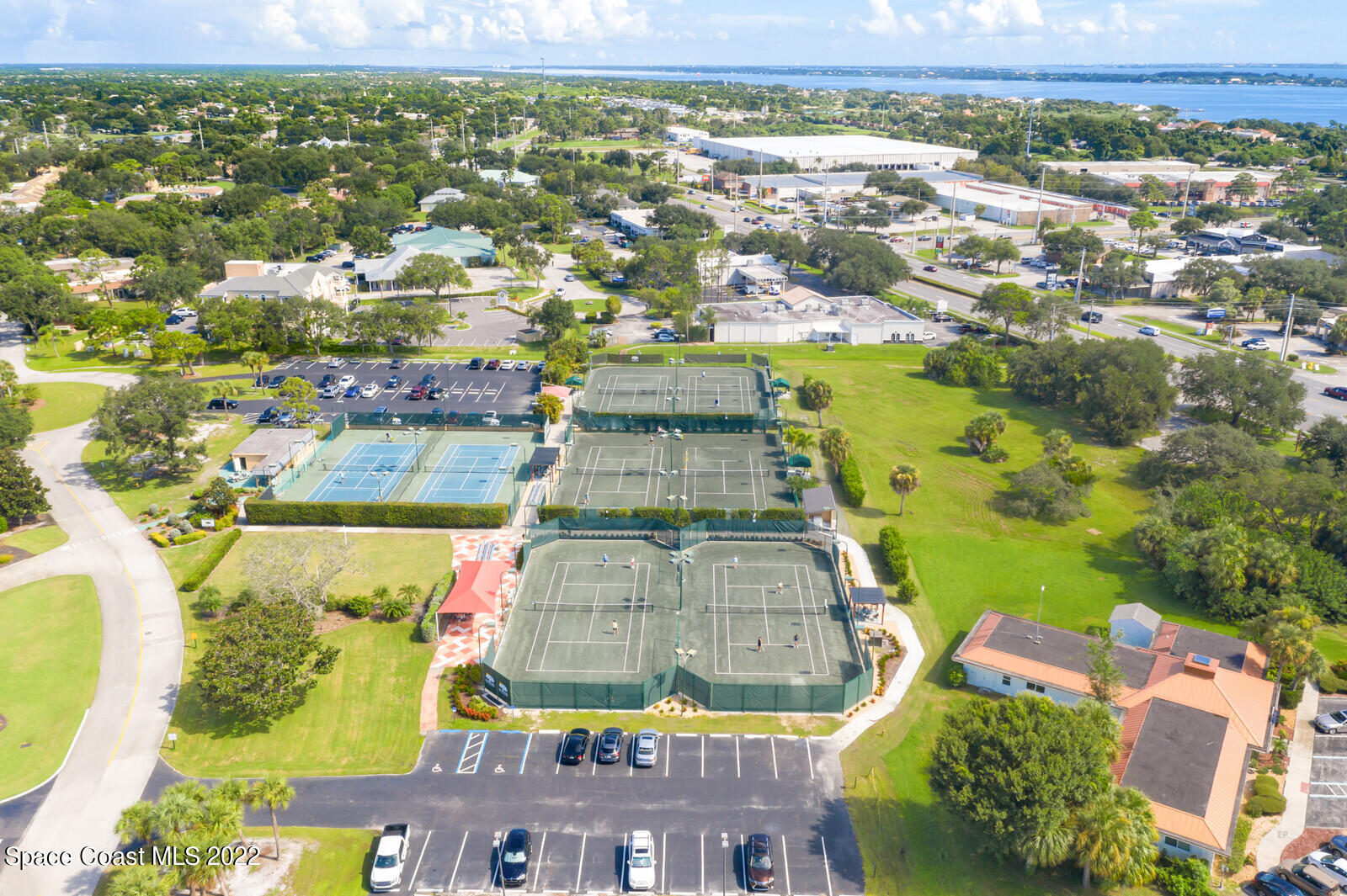 4270 Stoney Point Road Melbourne, FL 32940 - Photo 62 of 68 an aerial view of residential houses with outdoor space