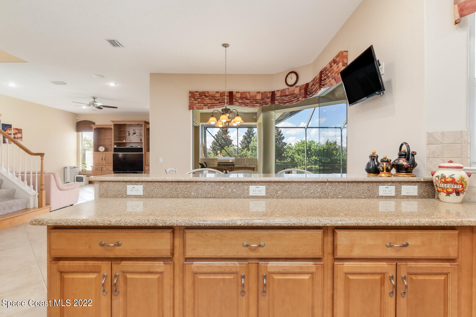 4270 Stoney Point Road Melbourne, FL 32940 - Photo 8 of 68 a kitchen with stainless steel appliances granite countertop a sink and a microwave